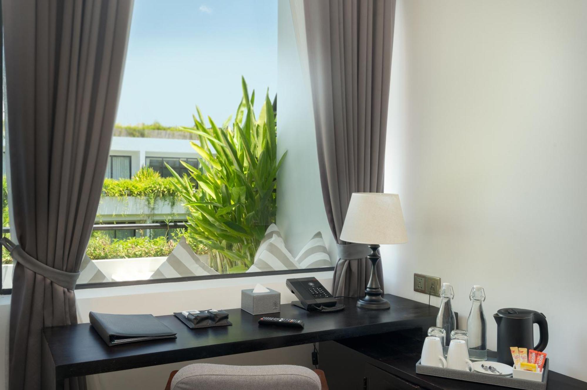 Eightfold Urban Resort Siem Reap Eksteriør bilde A room at the hotel